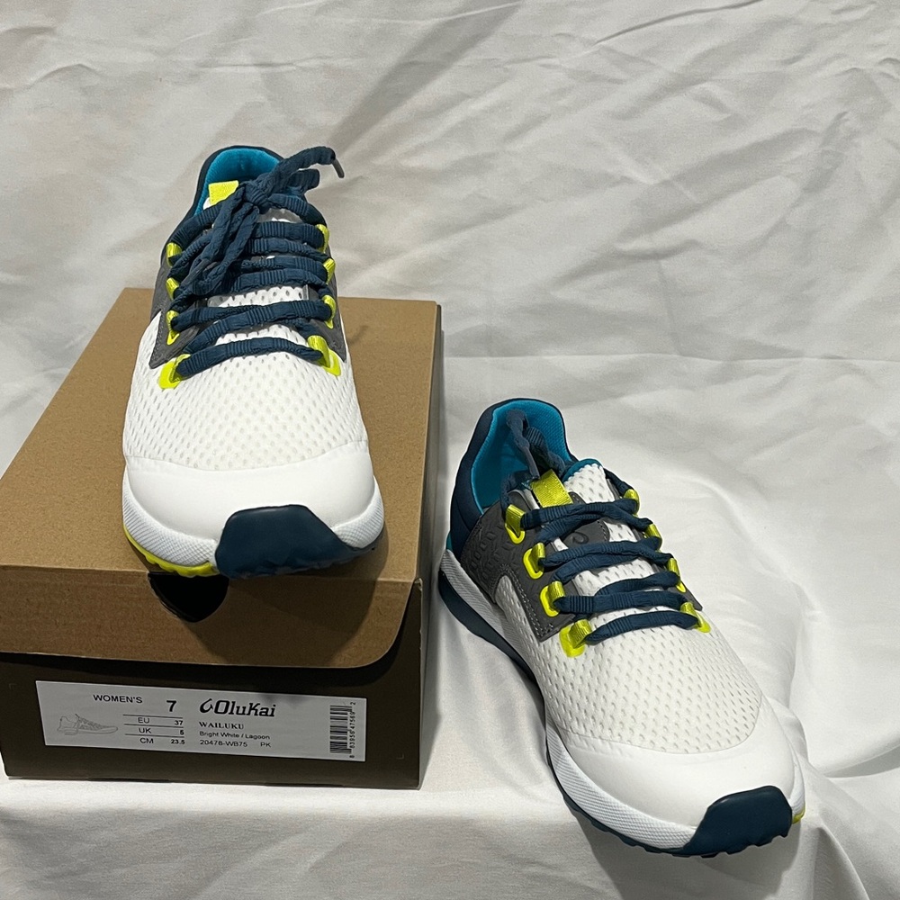 OluKai Women's White and Navy Sneakers with Yellow Accents